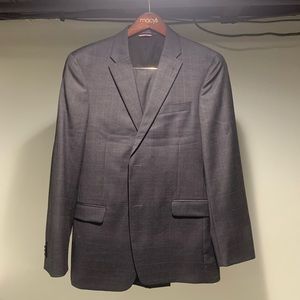 Men’s Tommy Hilfiger gray suit.  40R Jacket and 33x30 Pants.